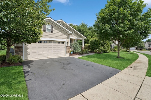 6 Day Star Rd, Manalapan, NJ 07726 - view of front of property with asphalt driveway and a front yard