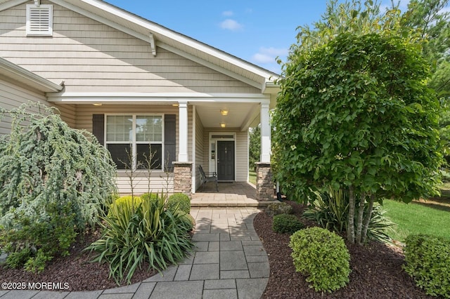 6 Day Star Rd, Manalapan, NJ 07726 - property entrance featuring a porch and stone siding