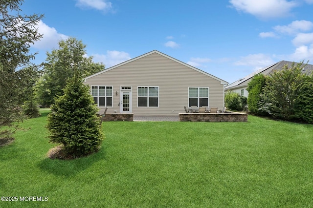6 Day Star Rd, Manalapan, NJ 07726 - rear view of house with a yard and a patio area