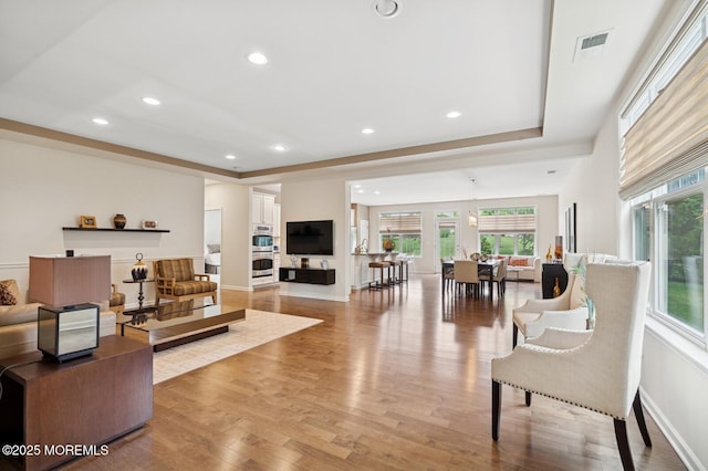 6 Day Star Rd, Manalapan, NJ 07726 - living area with healthy amount of natural light, light wood finished floors, and recessed lighting