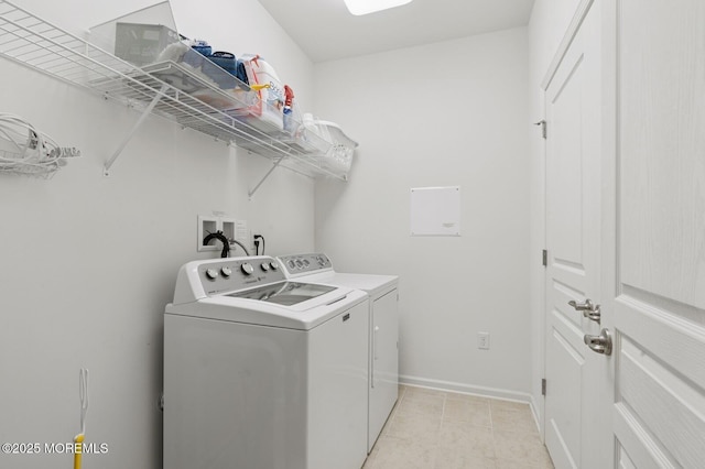 6 Day Star Rd, Manalapan, NJ 07726 - washroom with washer and clothes dryer and light tile patterned floors
