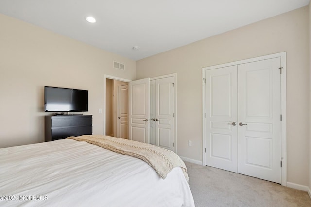 6 Day Star Rd, Manalapan, NJ 07726 - bedroom featuring multiple closets, light carpet, and recessed lighting