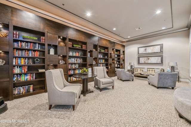 6 Day Star Rd, Manalapan, NJ 07726 - living area featuring carpet floors, recessed lighting, and bookshelves