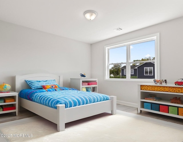 204 Morningside Ave, Union Beach, NJ 07735 - bedroom featuring wood finished floors and baseboards
