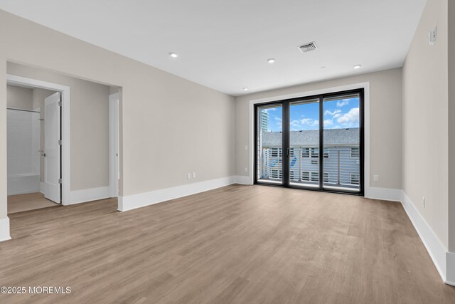 218 3rd Ave Unit 204, Asbury Park, NJ 07712 - empty room featuring light wood-style flooring and recessed lighting