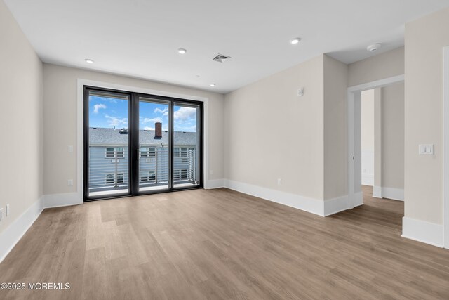 218 3rd Ave Unit 204, Asbury Park, NJ 07712 - empty room featuring light wood-style flooring and recessed lighting