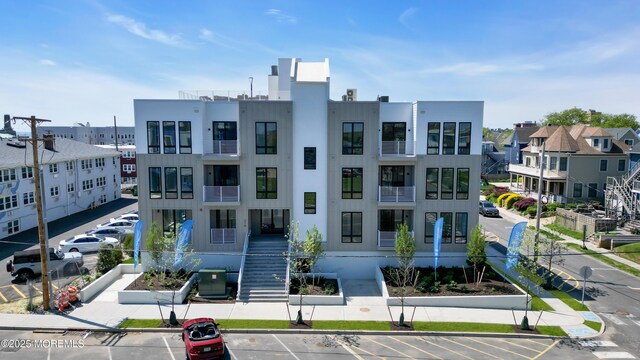 218 3rd Ave Unit 204, Asbury Park, NJ 07712 - view of building exterior featuring uncovered parking