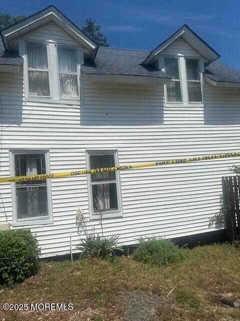610 Agnes Ave, Brielle, NJ 08730 - view of side of home featuring a shingled roof