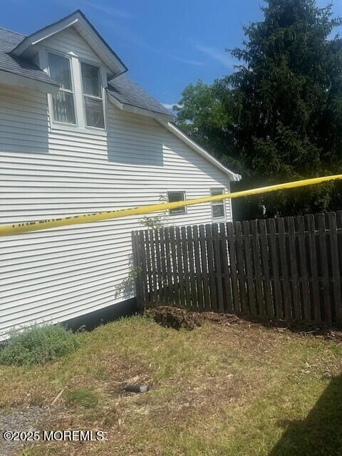 610 Agnes Ave, Brielle, NJ 08730 - view of side of property featuring roof with shingles