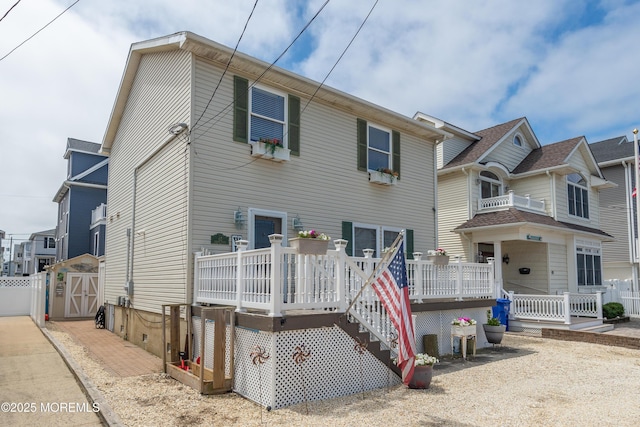 45 Fielder Ave, Seaside Heights, NJ 08751 - view of front facade featuring a deck and a shed