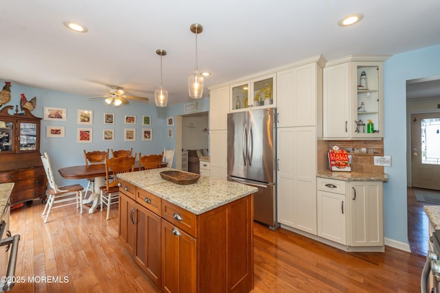 45 Fielder Ave, Seaside Heights, NJ 08751 - kitchen with freestanding refrigerator, light wood-type flooring, ceiling fan, glass insert cabinets, and recessed lighting