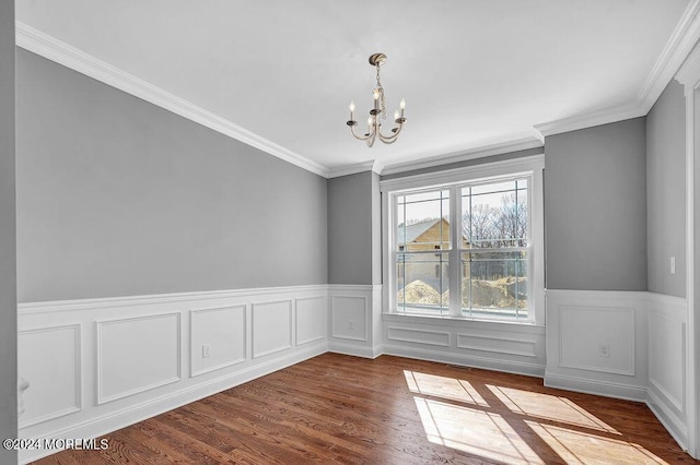 451 Woodbury Dr, Jackson, NJ 08527 - unfurnished dining area featuring a chandelier, dark wood finished floors, wainscoting, and crown molding