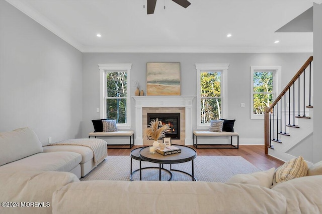 451 Woodbury Dr, Jackson, NJ 08527 - living area with plenty of natural light, a ceiling fan, wood finished floors, crown molding, and stairway