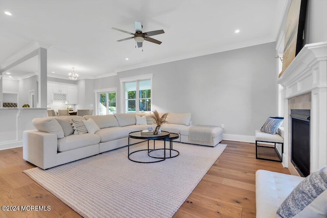 451 Woodbury Dr, Jackson, NJ 08527 - living room with crown molding, ceiling fan, a fireplace, light wood-style floors, and recessed lighting