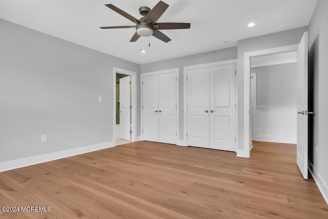 451 Woodbury Dr, Jackson, NJ 08527 - unfurnished bedroom with multiple closets, recessed lighting, light wood finished floors, and a ceiling fan