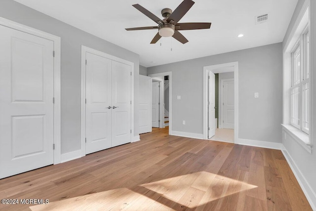 451 Woodbury Dr, Jackson, NJ 08527 - unfurnished bedroom featuring light wood-type flooring, recessed lighting, ceiling fan, and a closet