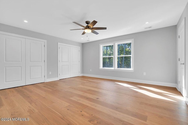 451 Woodbury Dr, Jackson, NJ 08527 - unfurnished bedroom with two closets, light wood-style floors, recessed lighting, and ceiling fan