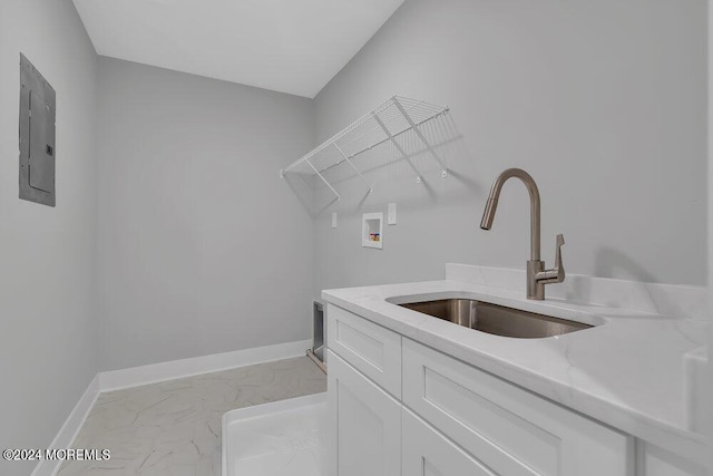 451 Woodbury Dr, Jackson, NJ 08527 - laundry area with hookup for a washing machine, electric panel, light marble finish floors, and cabinet space