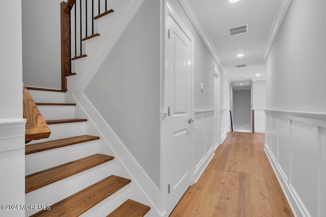 451 Woodbury Dr, Jackson, NJ 08527 - staircase with crown molding, wood finished floors, a wainscoted wall, a decorative wall, and recessed lighting
