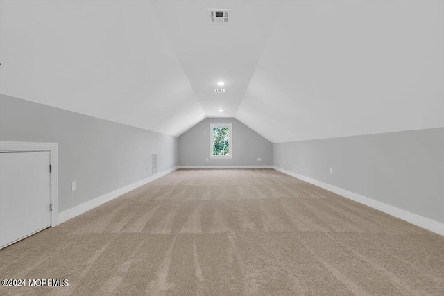 451 Woodbury Dr, Jackson, NJ 08527 - additional living space featuring lofted ceiling and light carpet