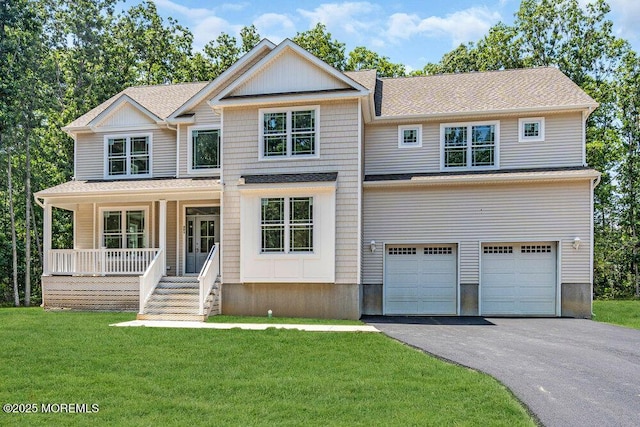 451 Woodbury Dr, Jackson, NJ 08527 - view of front of home featuring asphalt driveway, a front yard, a garage, covered porch, and a shingled roof