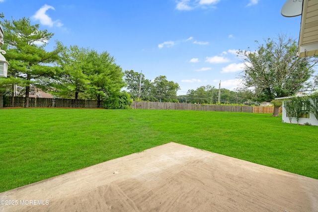 59 Mansfield Dr, Brick, NJ 08724 - fenced backyard featuring a patio area