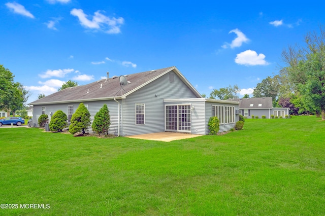 59 Mansfield Dr, Brick, NJ 08724 - rear view of house with a patio and a yard