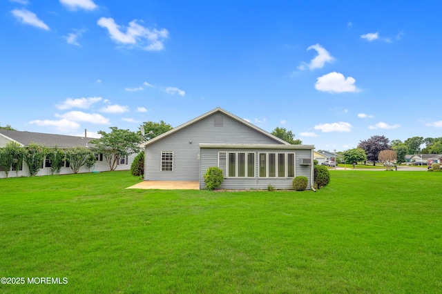 59 Mansfield Dr, Brick, NJ 08724 - rear view of property with a patio area and a lawn