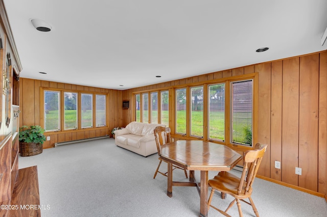 59 Mansfield Dr, Brick, NJ 08724 - dining area with baseboard heating, plenty of natural light, wooden walls, and carpet flooring
