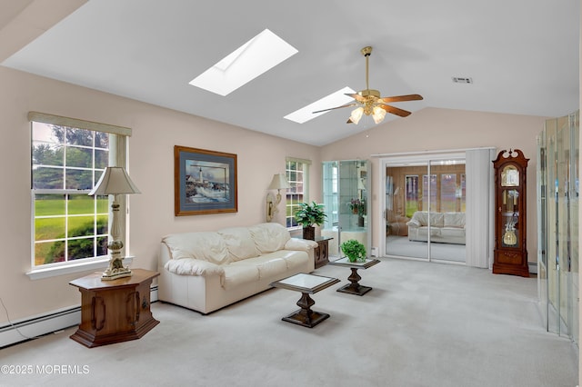 59 Mansfield Dr, Brick, NJ 08724 - living area featuring a baseboard heating unit, a skylight, lofted ceiling, and carpet flooring