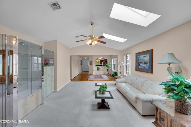 59 Mansfield Dr, Brick, NJ 08724 - living area featuring a skylight, vaulted ceiling, and a ceiling fan