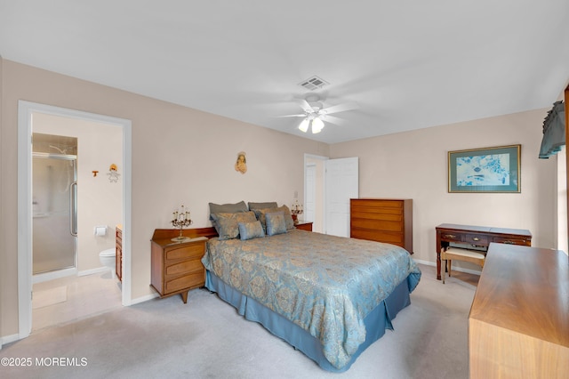 59 Mansfield Dr, Brick, NJ 08724 - bedroom with light colored carpet, ensuite bathroom, and a ceiling fan
