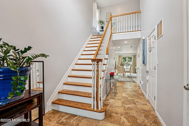 414 Bay Blvd Unit B, Seaside Heights, NJ 08751 - stairway with stone finish flooring and a towering ceiling