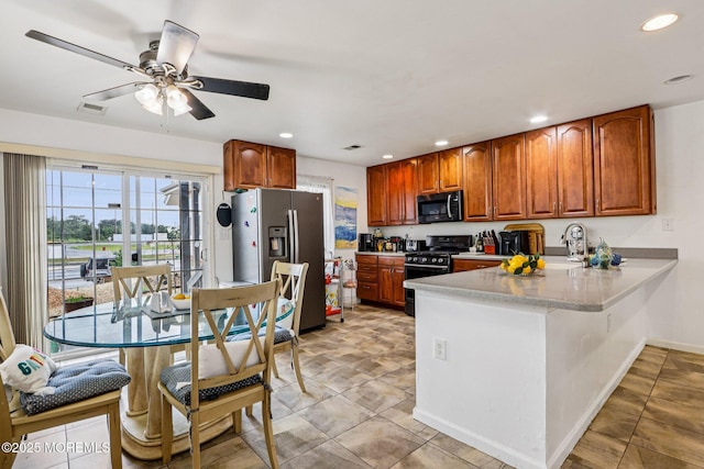 414 Bay Blvd Unit B, Seaside Heights, NJ 08751 - kitchen featuring black microwave, stainless steel refrigerator with ice dispenser, stove, a peninsula, and recessed lighting