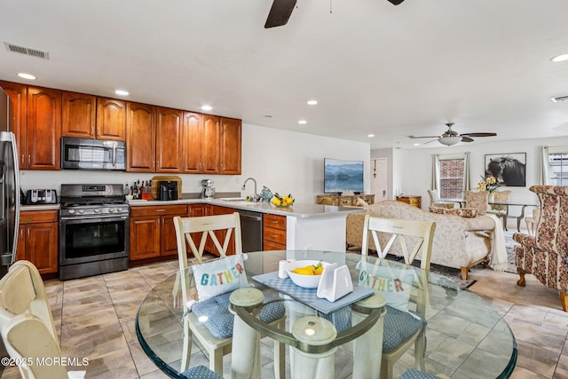 414 Bay Blvd Unit B, Seaside Heights, NJ 08751 - kitchen with stainless steel appliances, ceiling fan, recessed lighting, a peninsula, and open floor plan