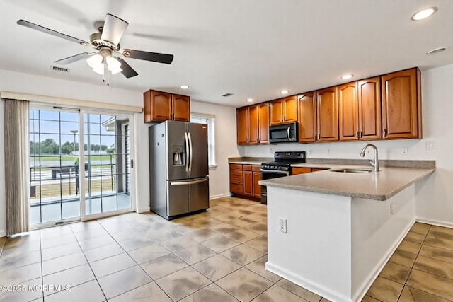 414 Bay Blvd Unit B, Seaside Heights, NJ 08751 - kitchen featuring stainless steel fridge, range with electric cooktop, a peninsula, healthy amount of natural light, and recessed lighting