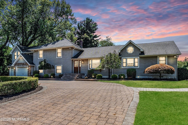 40 Centerville Rd, Holmdel, NJ 07733 - view of front of home featuring curved driveway, a front yard, and roof with shingles