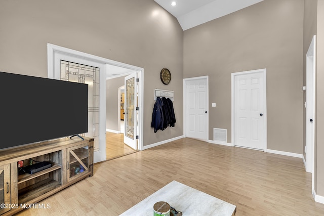 40 Centerville Rd, Holmdel, NJ 07733 - living area with high vaulted ceiling and wood finished floors