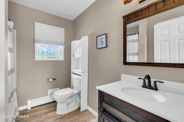 40 Centerville Rd, Holmdel, NJ 07733 - full bathroom with vanity, wood finished floors, and baseboard heating