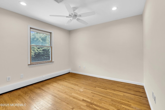 40 Centerville Rd, Holmdel, NJ 07733 - spare room with a baseboard radiator, wood finished floors, recessed lighting, and a ceiling fan