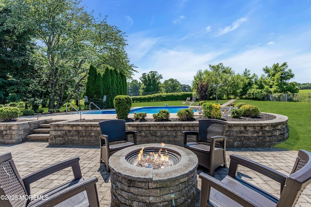40 Centerville Rd, Holmdel, NJ 07733 - view of patio / terrace featuring an outdoor fire pit, an outdoor pool, and view of wooded area
