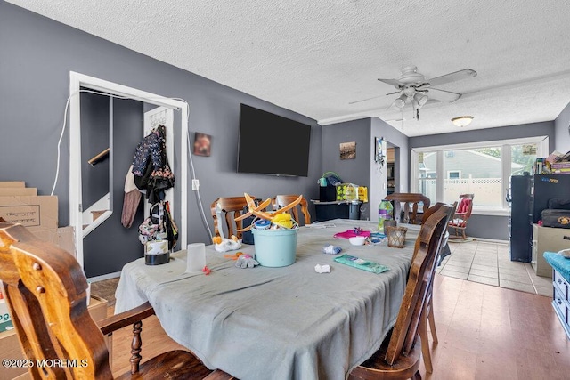 720 Weehawken Ave, Forked River, NJ 08731 - dining room with ceiling fan, a textured ceiling, stairway, and wood finished floors