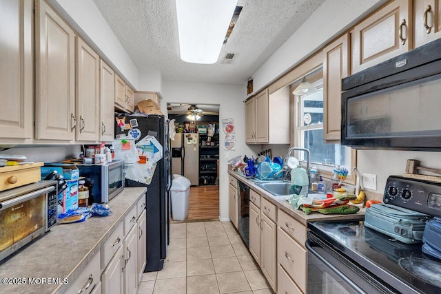 720 Weehawken Ave, Forked River, NJ 08731 - kitchen featuring black appliances, a textured ceiling, light countertops, ceiling fan, and light tile patterned floors
