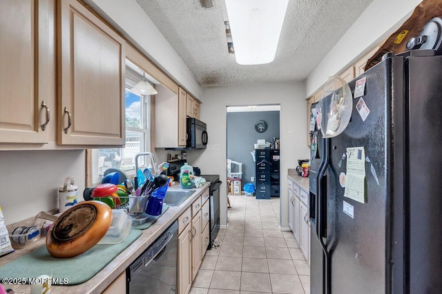 720 Weehawken Ave, Forked River, NJ 08731 - kitchen with black appliances, a textured ceiling, light countertops, light brown cabinets, and light tile patterned floors