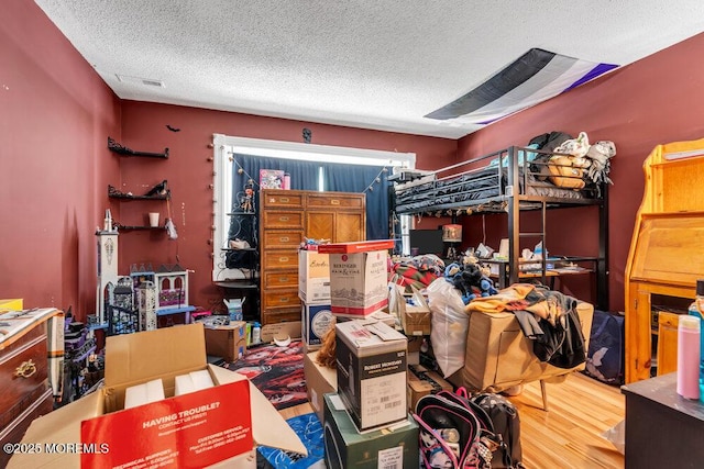 720 Weehawken Ave, Forked River, NJ 08731 - bedroom with a textured ceiling and wood finished floors