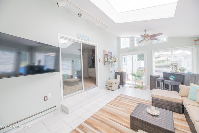 1920 Kenilworth Ct, Toms River, NJ 08753 - living room featuring light tile patterned floors, rail lighting, and ceiling fan