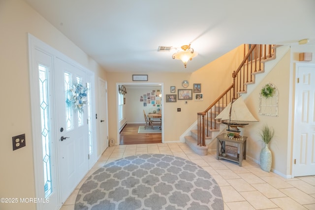 1920 Kenilworth Ct, Toms River, NJ 08753 - tiled entrance foyer featuring stairway and plenty of natural light