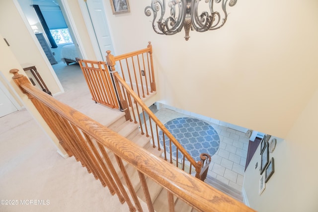 1920 Kenilworth Ct, Toms River, NJ 08753 - staircase featuring a chandelier and carpet floors