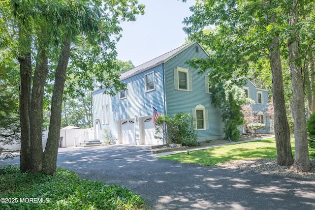 1920 Kenilworth Ct, Toms River, NJ 08753 - view of front facade featuring asphalt driveway and an attached garage