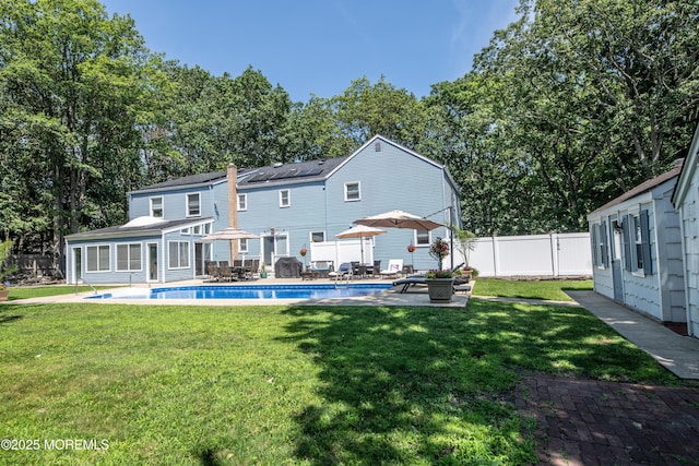 1920 Kenilworth Ct, Toms River, NJ 08753 - rear view of property with a patio area, a fenced backyard, and an outdoor structure